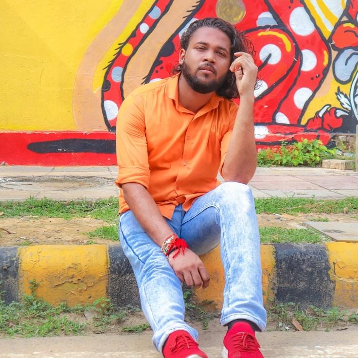 Kaveri Mehta, Lead Design Curator at Field Pixel Studio, reviewing corporate floral arrangements