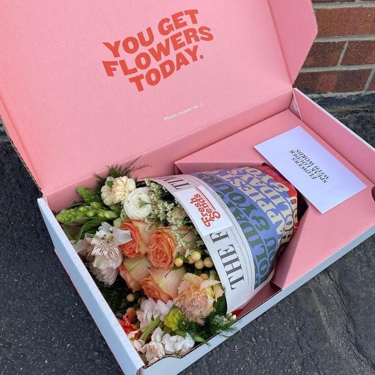 Corporate meeting room with carefully timed floral arrangements that maintain elegance throughout business hours